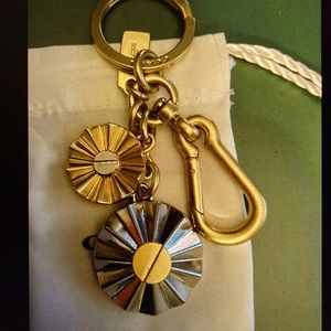 Coach two Turnlock Silver & Gold nwot bag charm
